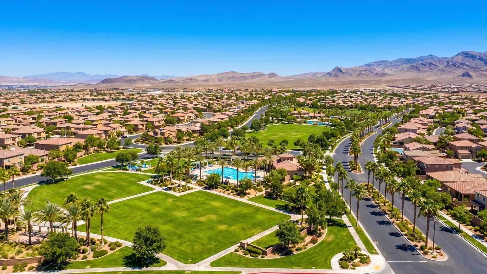 Dragon Rock at MacDonald Highlands — double guard-gated ultra-luxury enclave with panoramic Strip and valley views above Henderson, NV